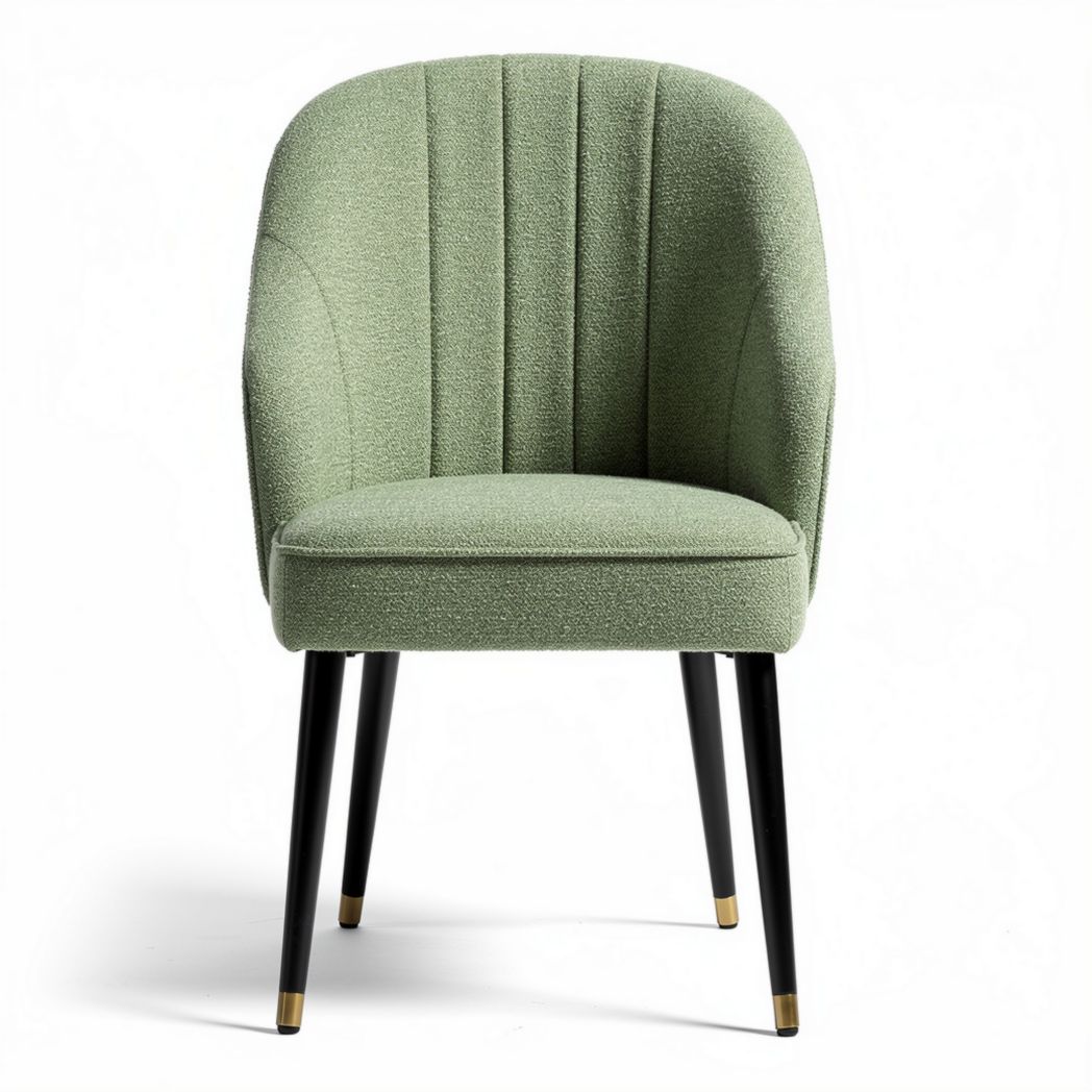 Green upholstered dining chair with black metal legs and gold accents
