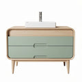 Wooden bathroom vanity with green drawer front and ceramic sink 80 x 50 x 85cm